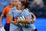 Desiree Miller scored a hat-trick of tries for the Waratahs in the grand final against the Drua. (Dean Lewins/AAP PHOTOS)